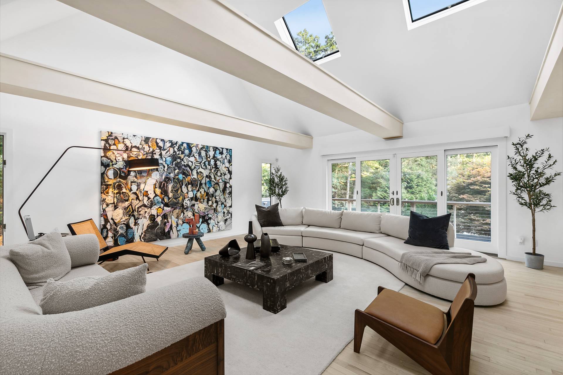 5 Jasons Lane East Hampton, NY 11937 - Photo 3 of 12 a living room with furniture and a large window