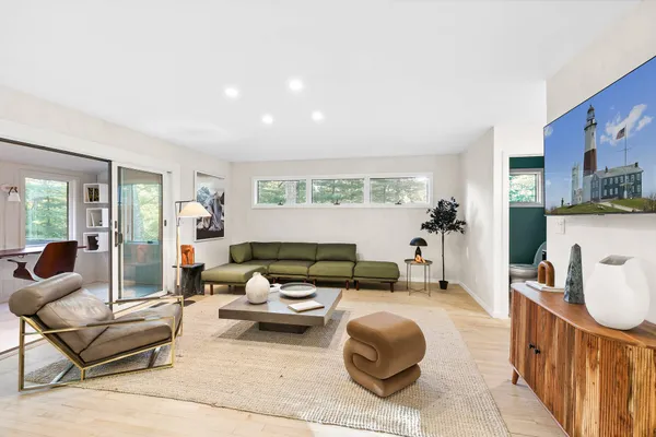 a living room with furniture and a couch