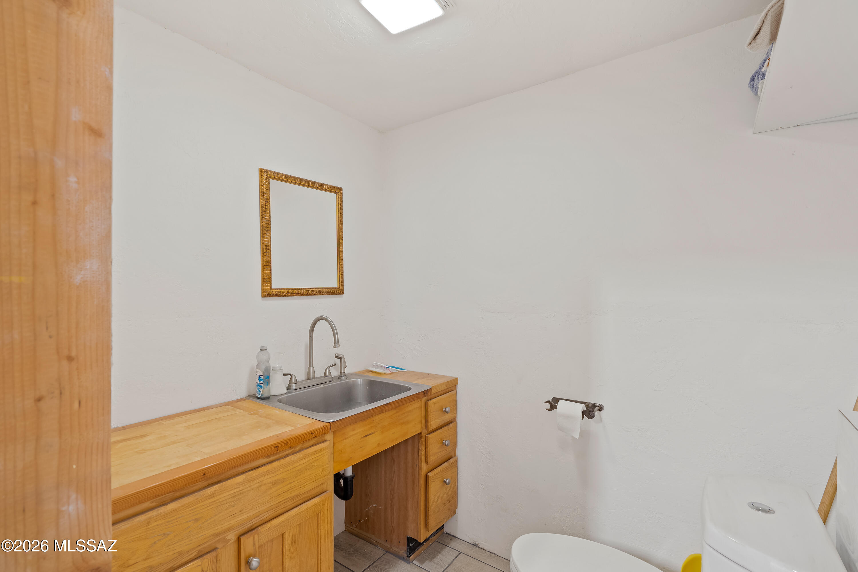 7005 North Wade Road Tucson, AZ 85743 - Photo 36 of 50 Half Bath in Garage