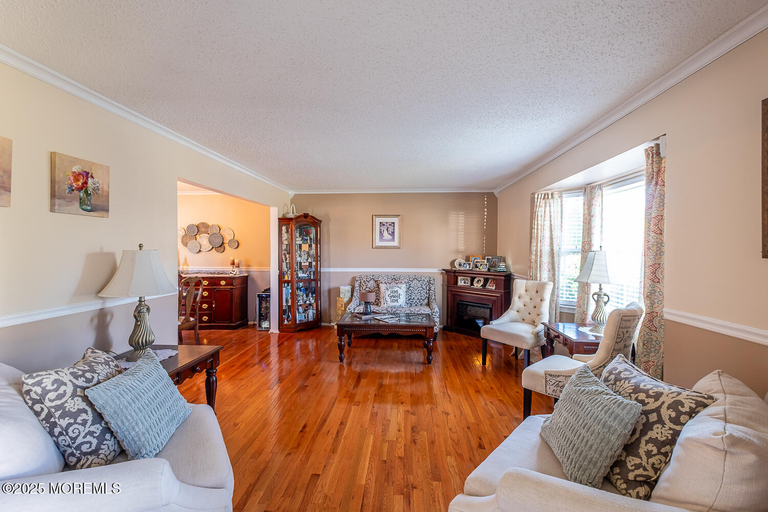 40 Gladiola Drive Howell, NJ 07731 - Photo 5 of 26 a living room with furniture and wooden floor