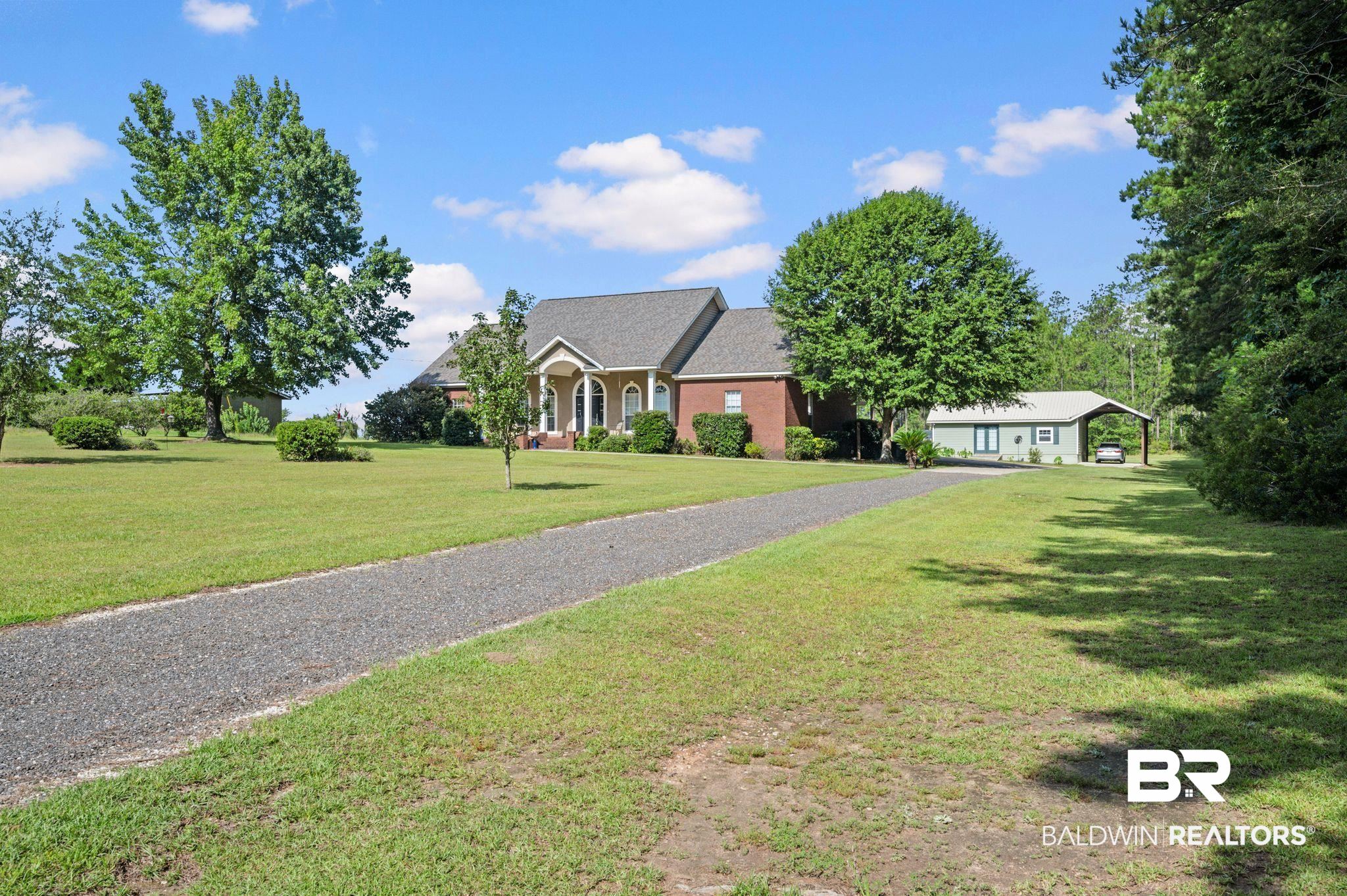 48513 Phillipsville Road Bay Minette, AL 36507 - Photo 47 of 50 View of front of property featuring a front yard and driveway