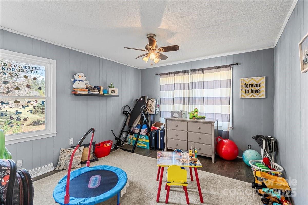 1241 Red River Road Rock Hill, SC 29730 - Photo 16 of 24 a children room with toys and a wooden floor