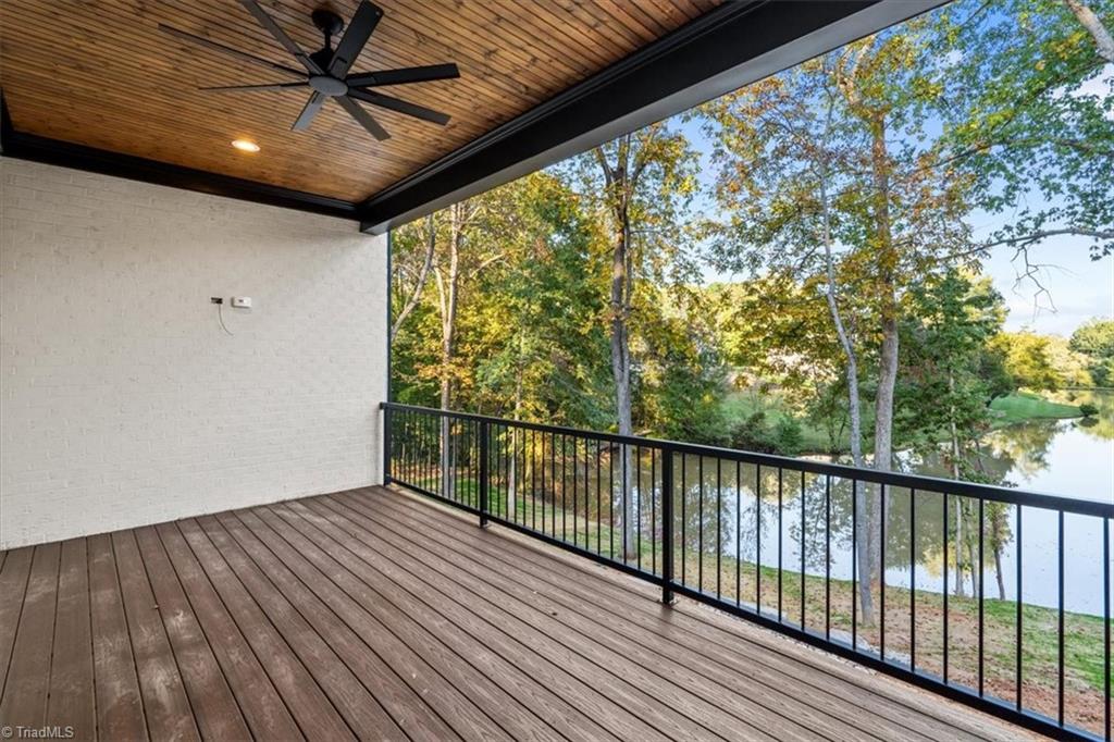 8111 Falcon Trail Oak Ridge, NC 27310 - Photo 24 of 50 lake view on main level covered porch