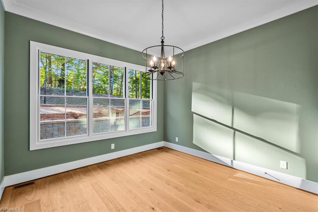 8111 Falcon Trail Oak Ridge, NC 27310 - Photo 32 of 50 main level office or guest suite