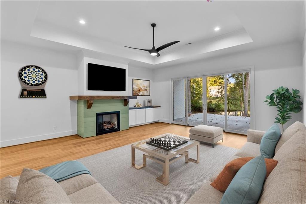 8111 Falcon Trail Oak Ridge, NC 27310 - Photo 5 of 50 basement rec room with walkout patio