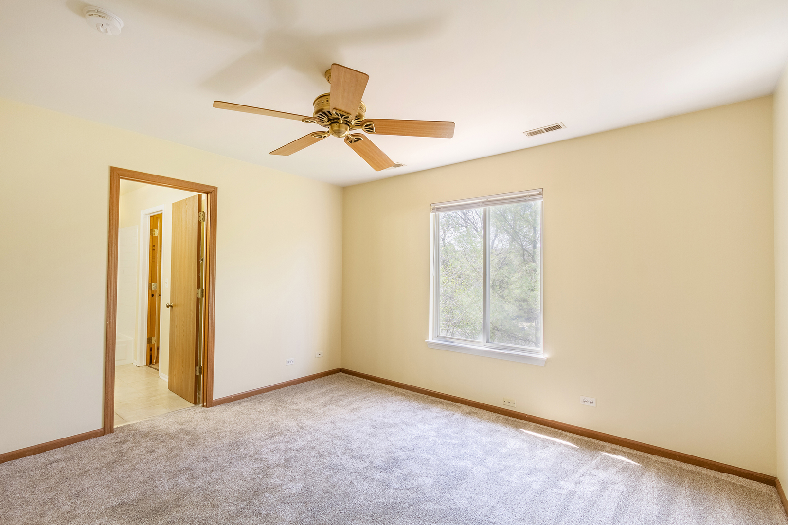 2624 Idaho Road Naperville, IL 60564 - Photo 14 of 23 a view of an empty room with a window