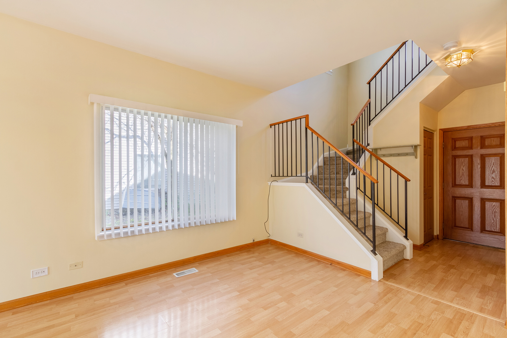 2624 Idaho Road Naperville, IL 60564 - Photo 4 of 23 a view of an empty room with stairs