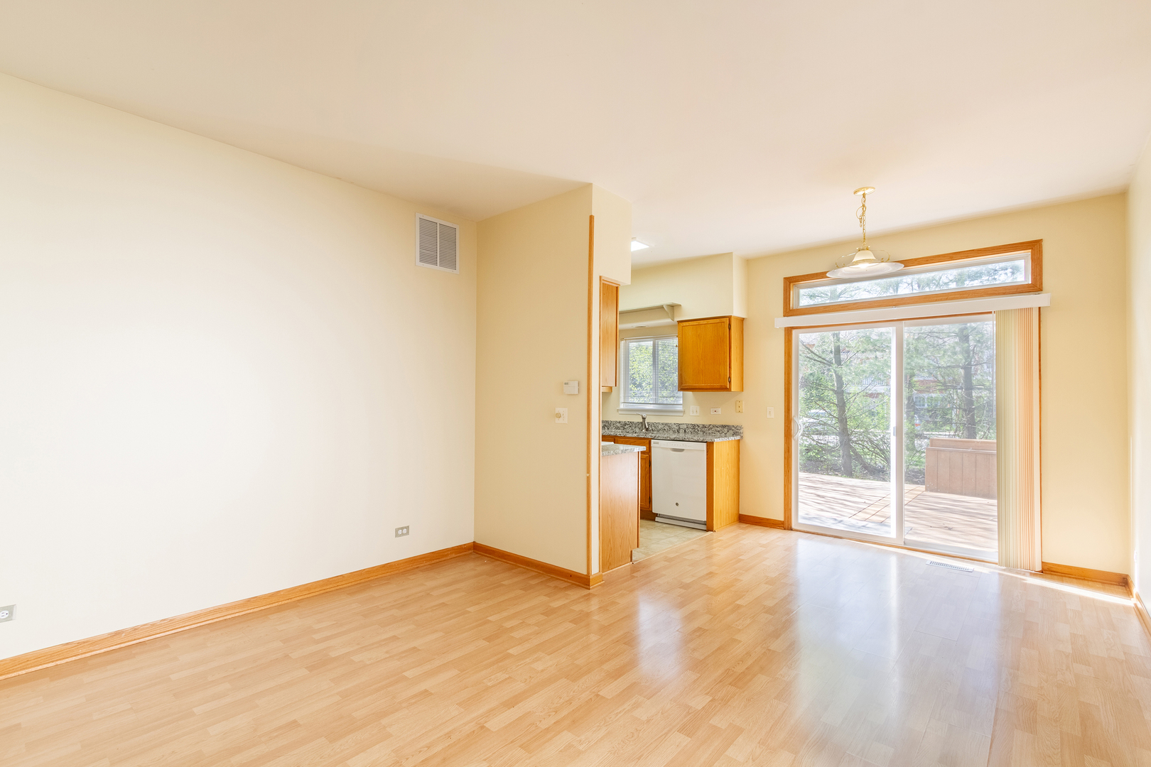 2624 Idaho Road Naperville, IL 60564 - Photo 5 of 23 a view of a kitchen with an empty space and a window