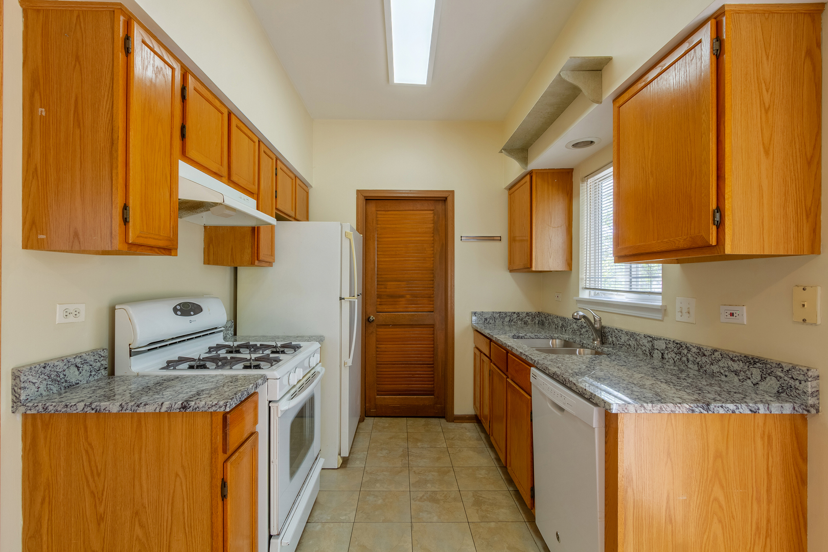 2624 Idaho Road Naperville, IL 60564 - Photo 9 of 23 a kitchen with stainless steel appliances granite countertop a stove a sink and a refrigerator
