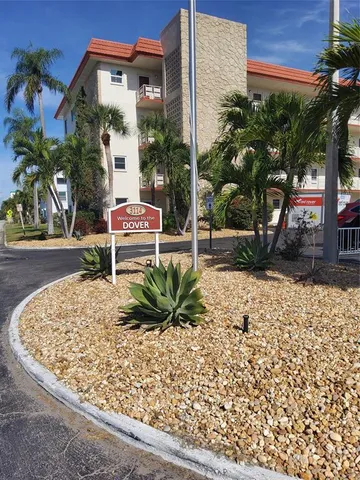 a view of a bench in front of building