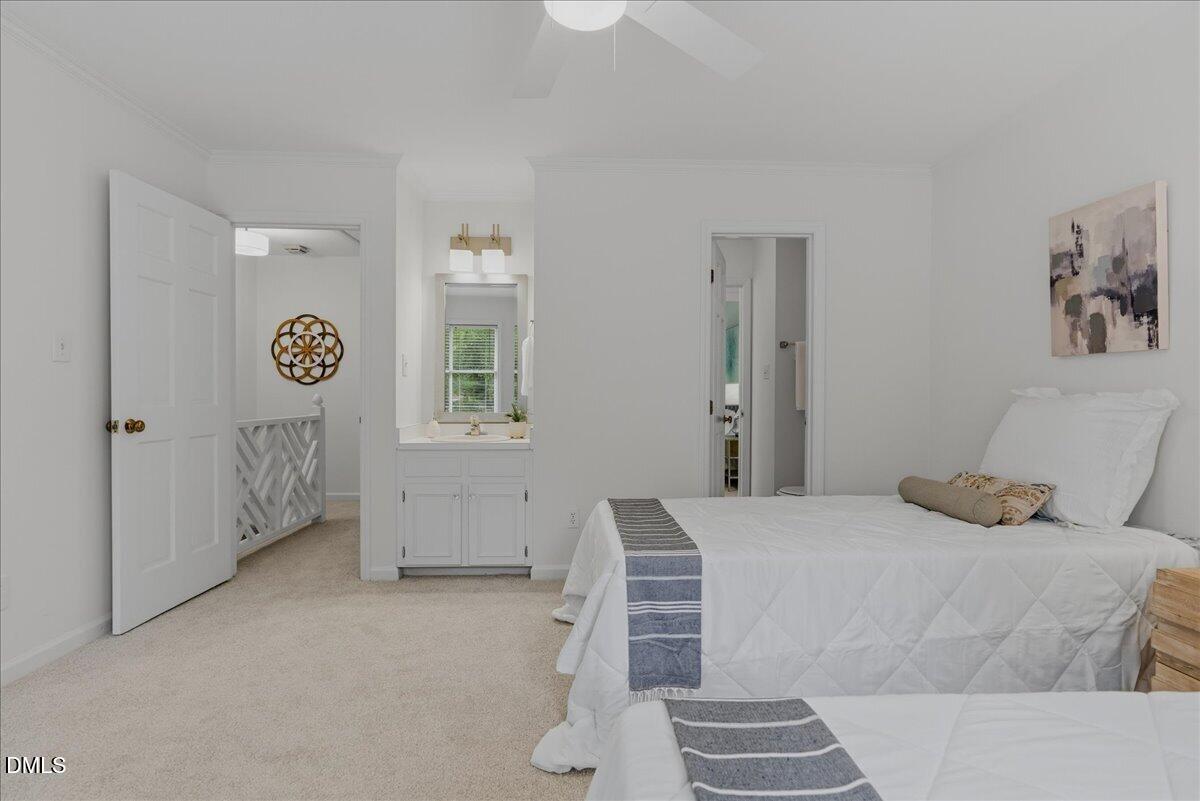 2834 Wayland Drive Raleigh, NC 27608 - Photo 19 of 26 a bedroom with a bed and wall painting