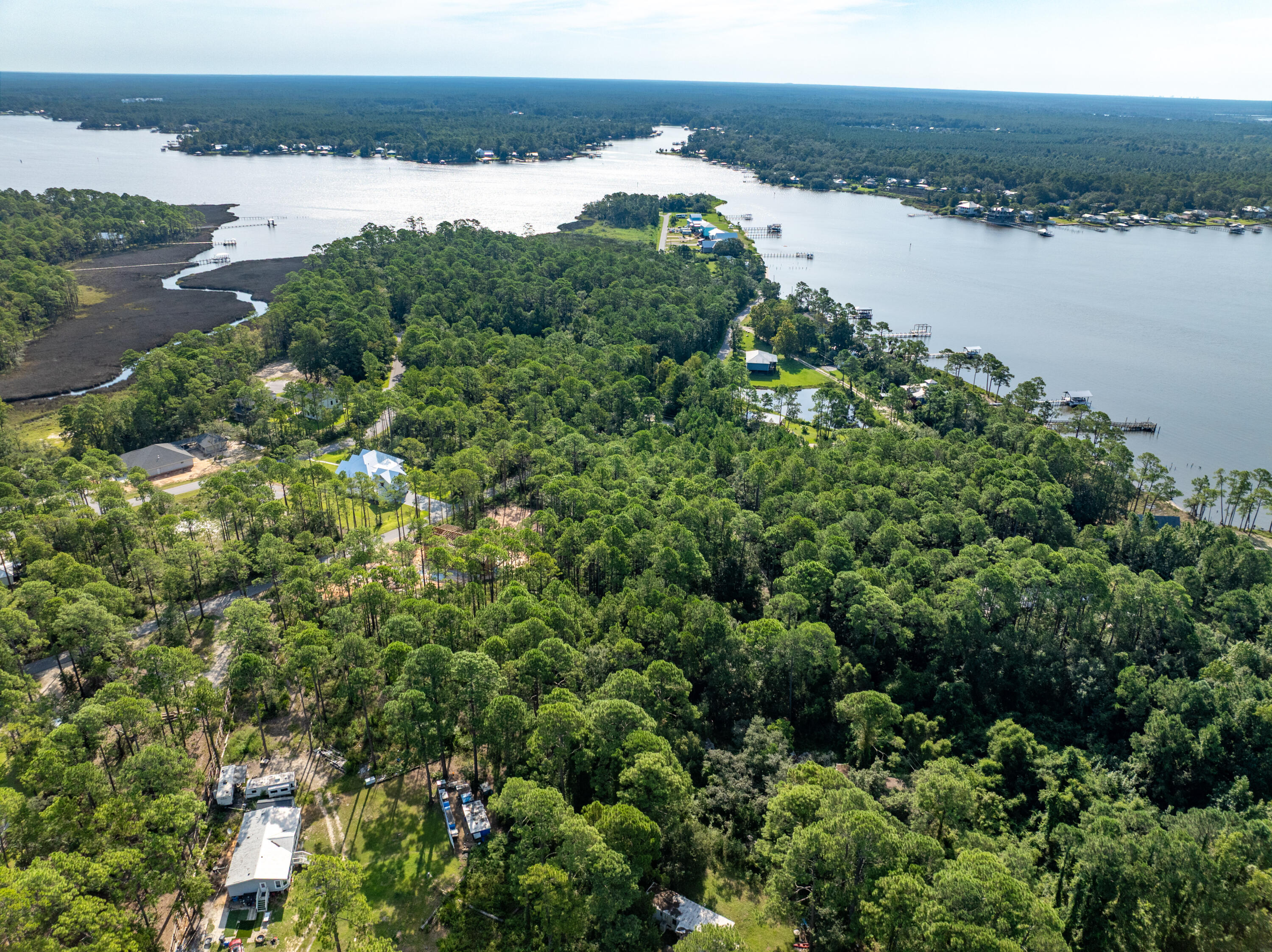 16-acres Beatrice Point Road Freeport, FL 32439 - Photo 24 of 37 an aerial view of a houses with a lake view