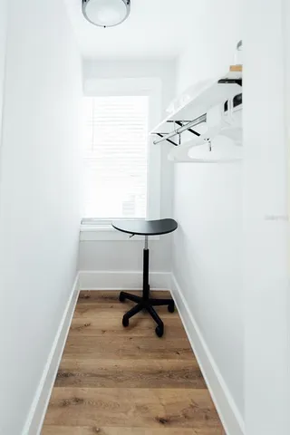 a view of a room with a sink and a window