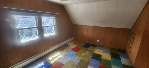 an empty room with entrance door