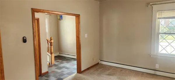 an empty room with windows