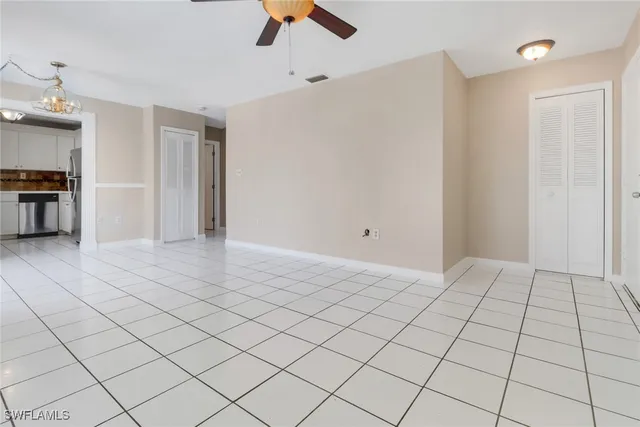 a view of an empty room and window