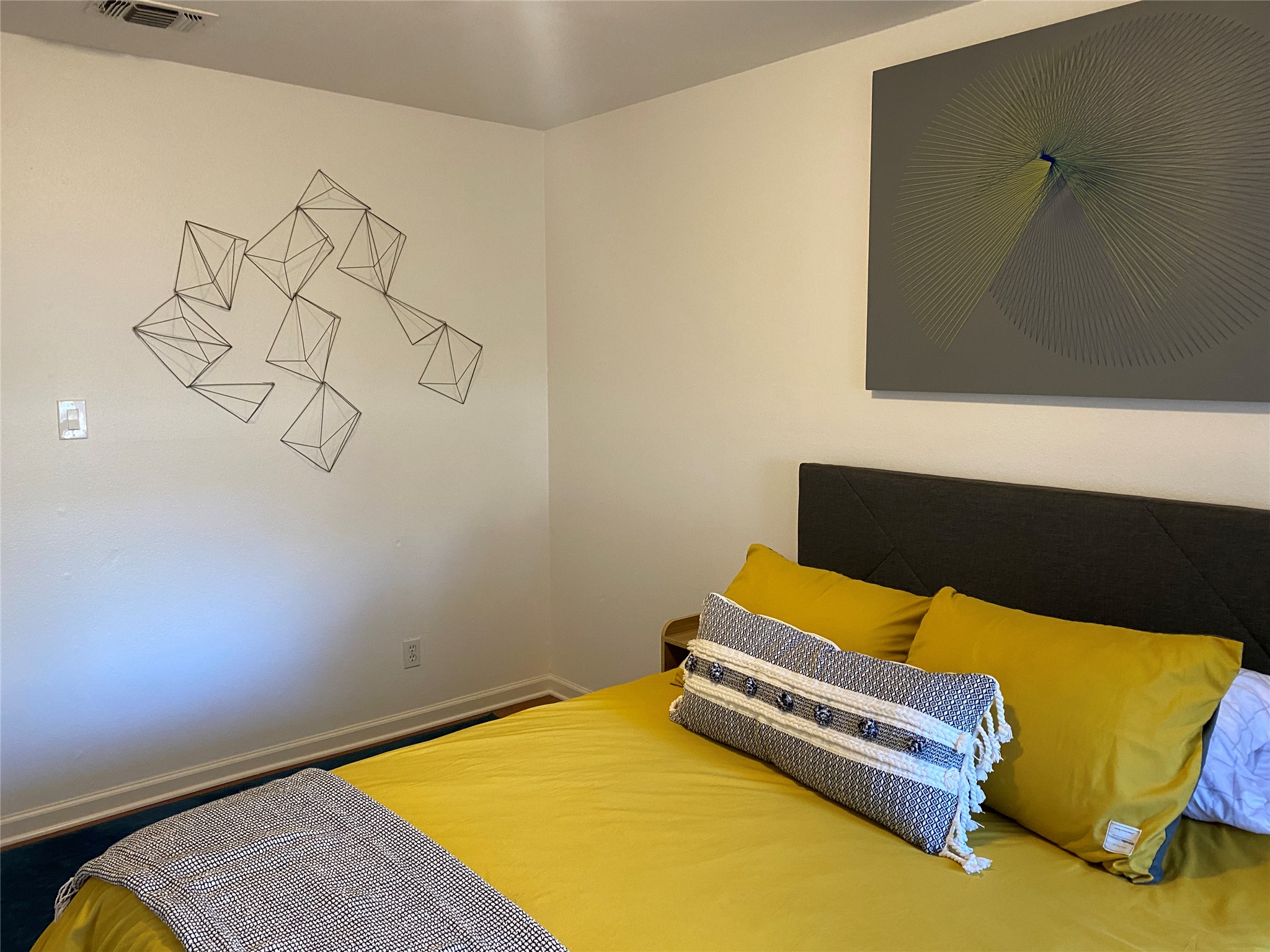 5405 Brompton Circle, Unit B Austin, TX 78745 - Photo 14 of 19 Bedroom featuring baseboards