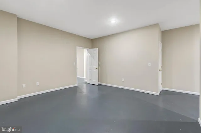 a view of balcony with wooden floor and fence