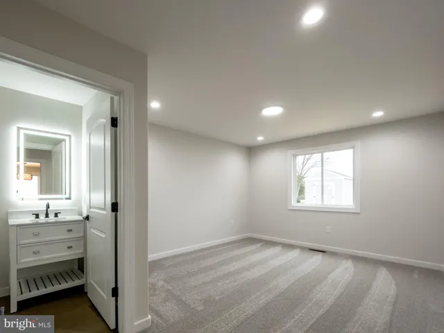 a bathroom with a sink toilet and bathtub