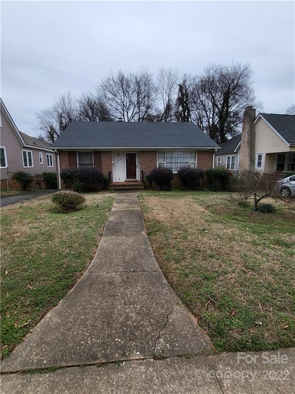 front view of a house with yard