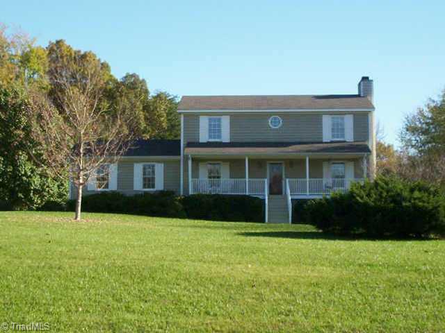 7705 Knollcrest Drive Oak Ridge, NC 27310 - Photo 1 of 8 Exterior Front.