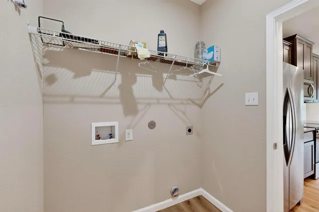 a view of a room with racks on the wall