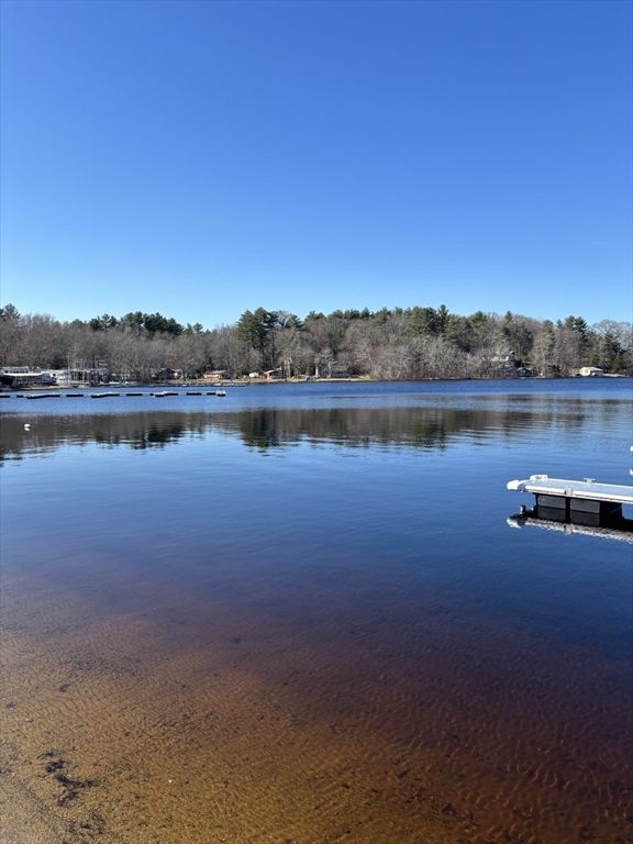 262 Shetucket Turnpike, Unit 112 Griswold, CT 06351 - Photo 3 of 25 a view of a lake with houses in the back