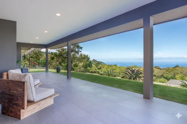 a view of an chairs and tables in the patio