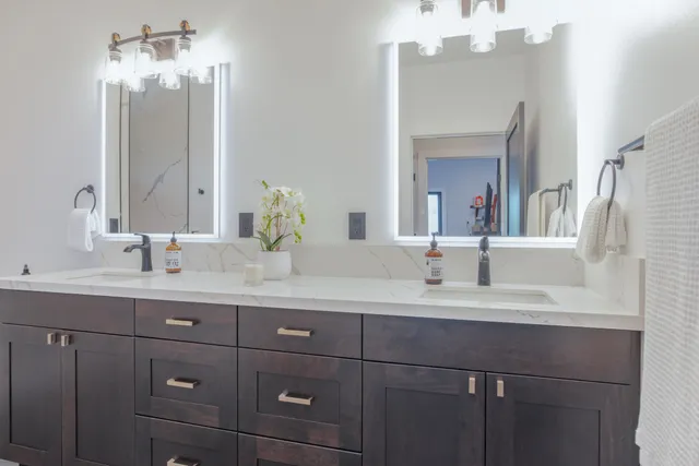 a view of living room filled with furniture and floor to ceiling window