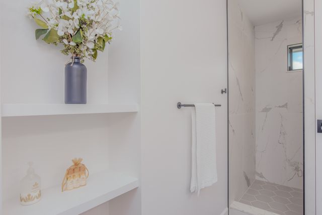 a view of a house with swimming pool and yard