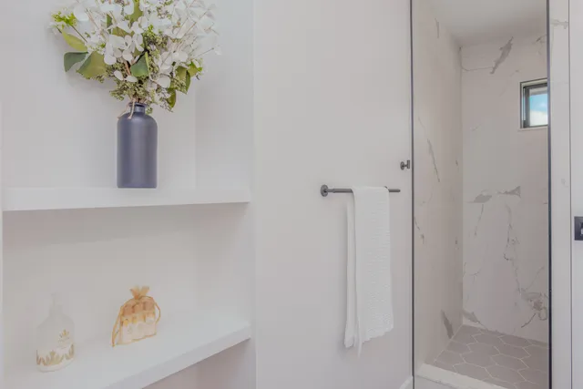 a view of a house with swimming pool and yard