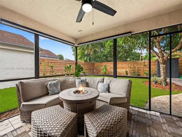 a view of a patio with couches and a table