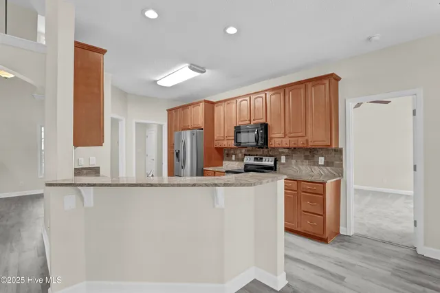 $579,000 | 203 Golf Terrace Court, Hampstead, NC 28443