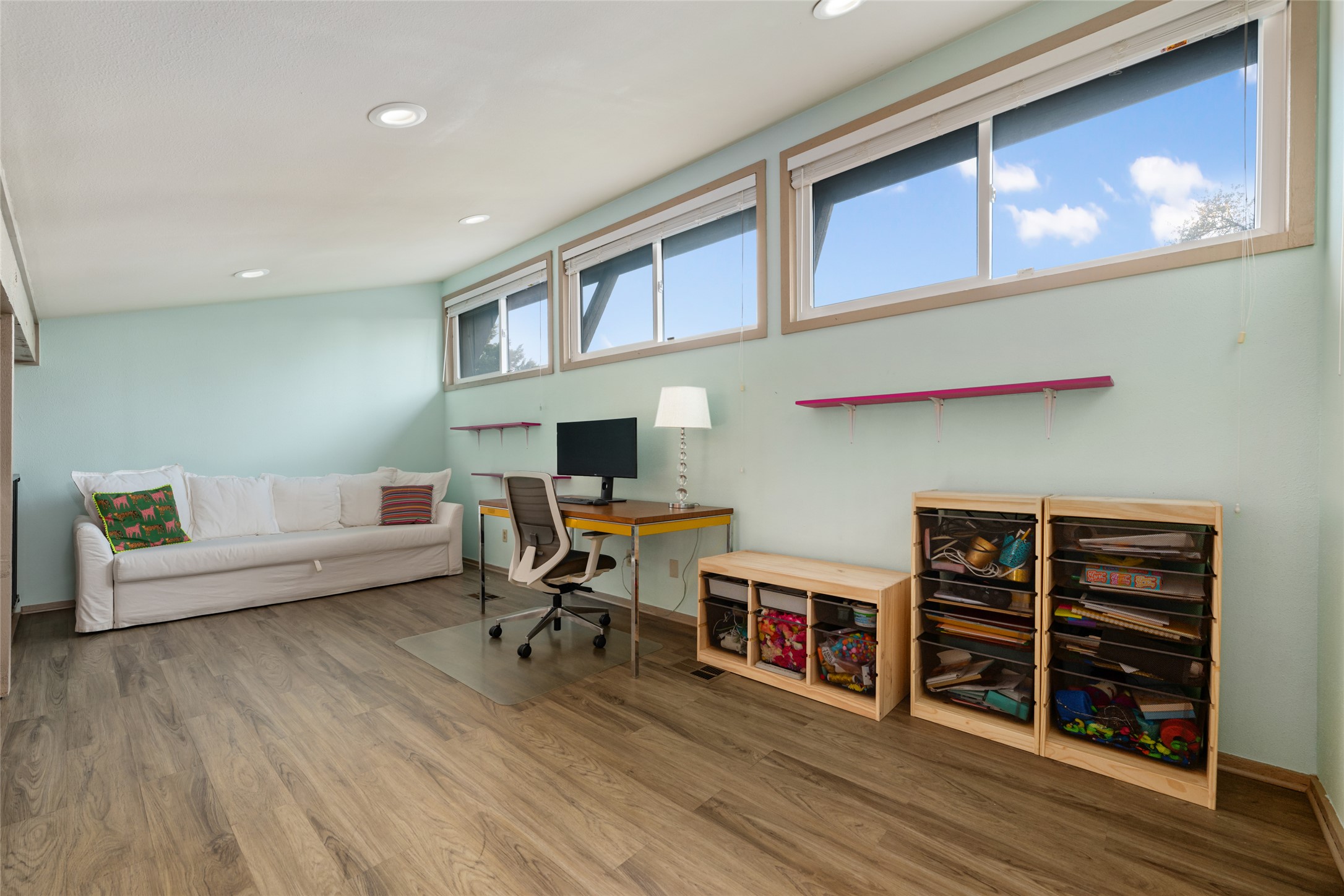 2210 Red Fox Road Austin, TX 78734 - Photo 28 of 40 a living room with furniture and a wooden floor