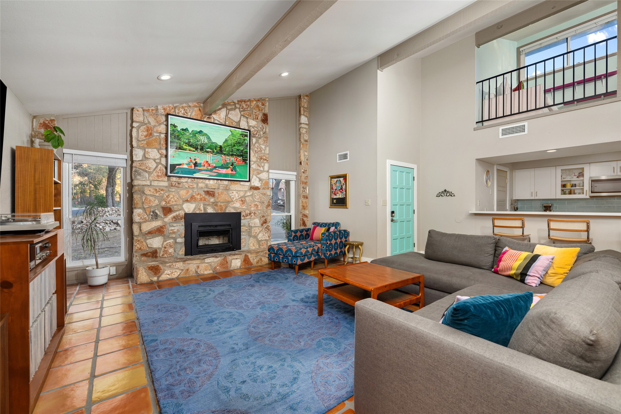 2210 Red Fox Road Austin, TX 78734 - Photo 7 of 40 a living room with furniture and a fireplace
