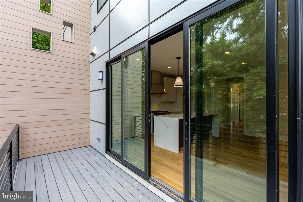 71 Maple Street Princeton, NJ 08542 - Photo 17 of 68 a view of livingroom from a balcony