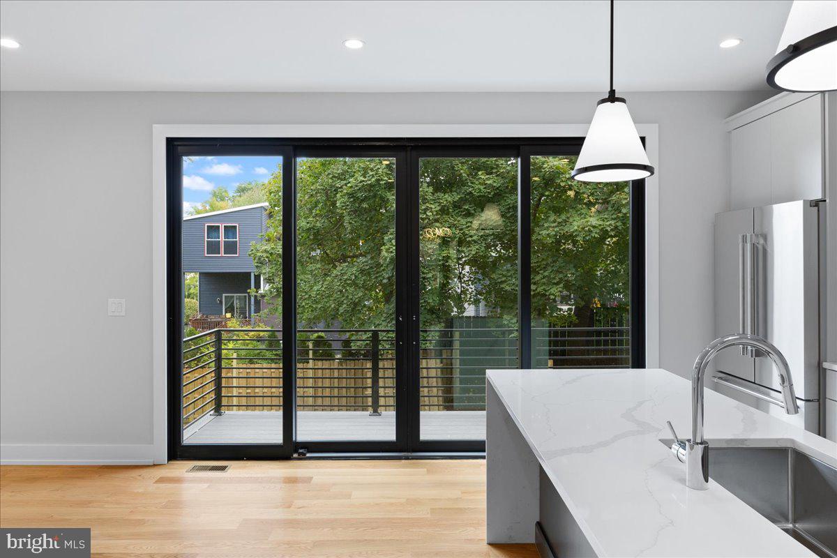 71 Maple Street Princeton, NJ 08542 - Photo 25 of 68 a view of a room with a large window and wooden floor