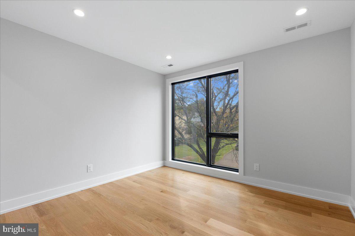 71 Maple Street Princeton, NJ 08542 - Photo 33 of 68 an empty room with sliding door