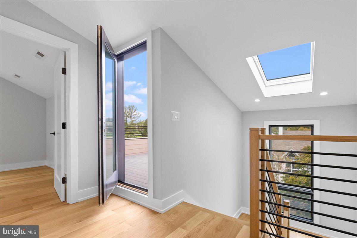 71 Maple Street Princeton, NJ 08542 - Photo 43 of 68 a view of a livingroom with wooden floor and windows