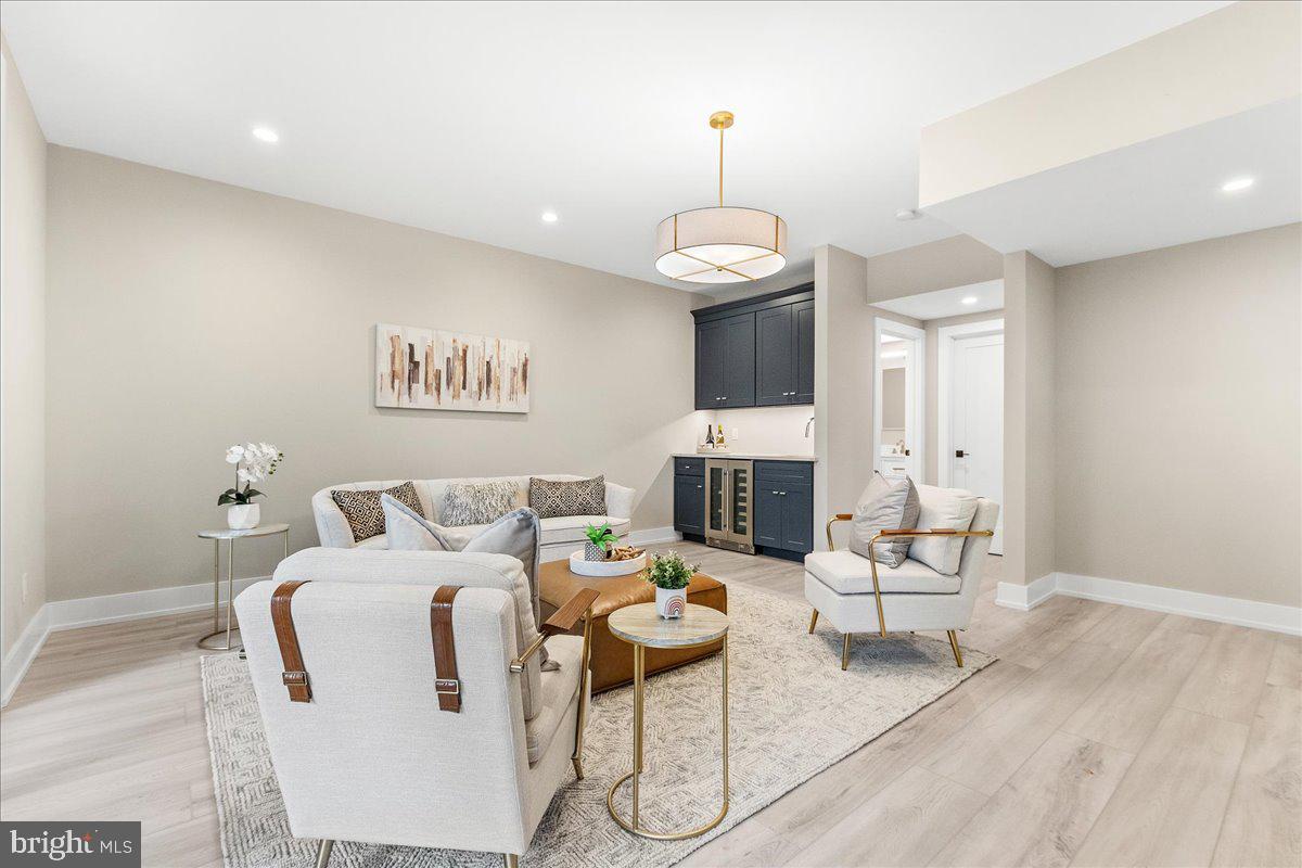71 Maple Street Princeton, NJ 08542 - Photo 48 of 68 a living room with furniture and a wooden floor