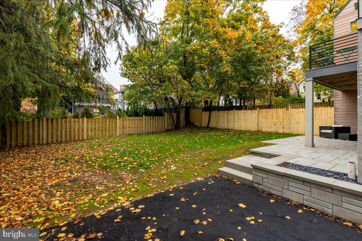 71 Maple Street Princeton, NJ 08542 - Photo 60 of 68 a view of a backyard with a garden