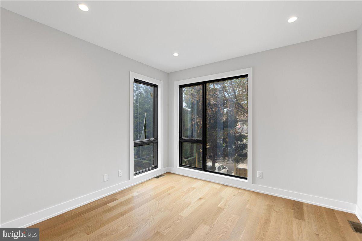 71 Maple Street Princeton, NJ 08542 - Photo 6 of 68 a view of an empty room with glass door