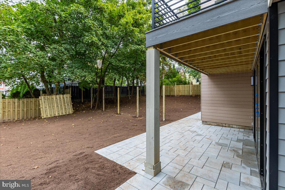 71 Maple Street Princeton, NJ 08542 - Photo 68 of 68 a view of backyard with small cabin and wooden fence