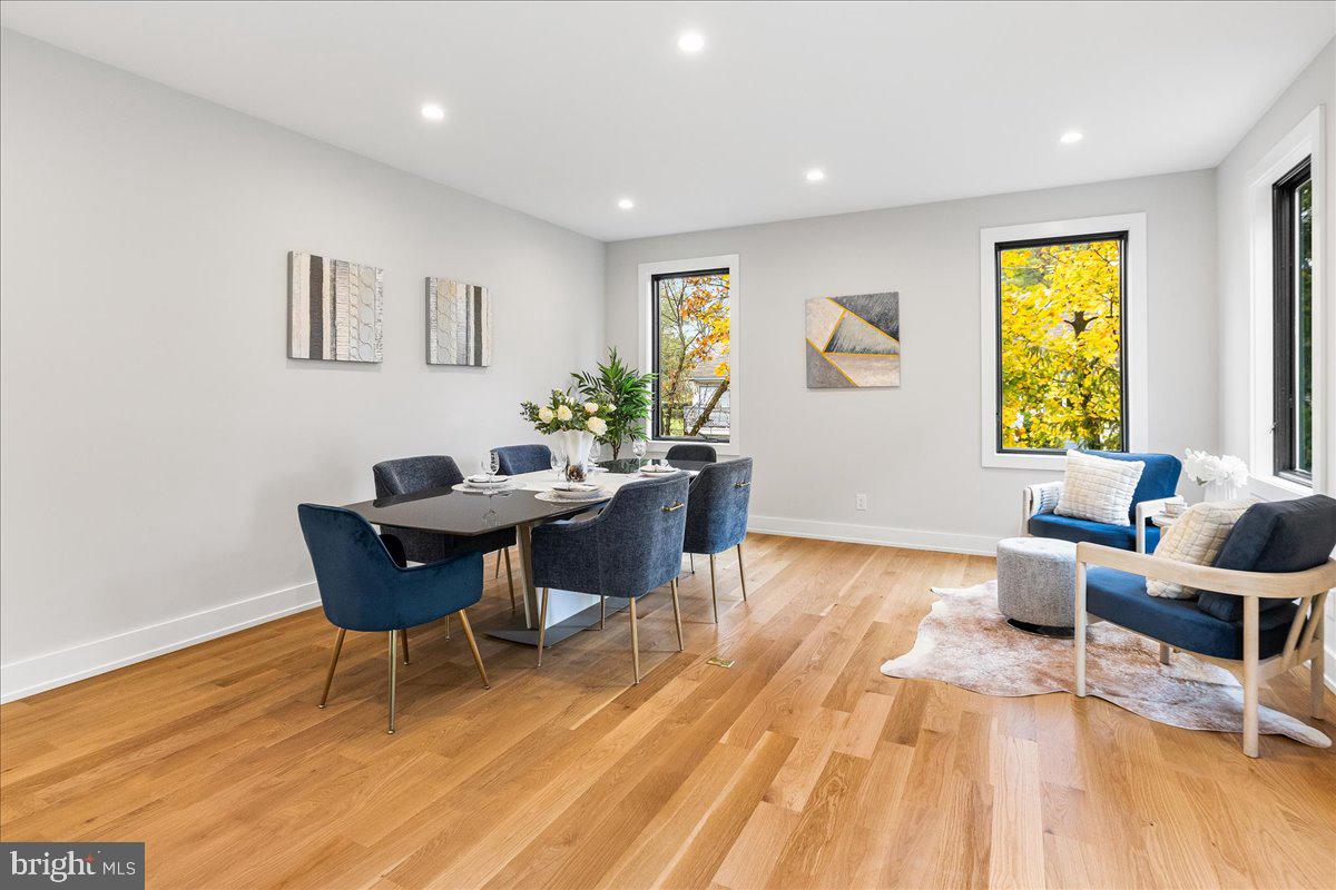 71 Maple Street Princeton, NJ 08542 - Photo 7 of 68 a view of a dining room with furniture and a wooden floor