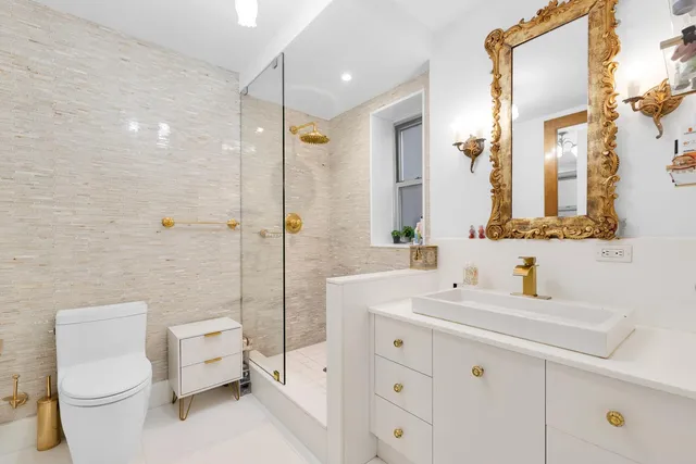 a view of a chairs and table in a backyard