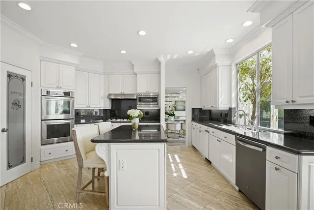 a large kitchen with cabinets