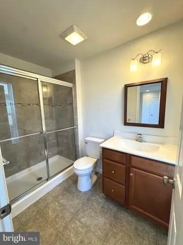 en empty room with windows and closet