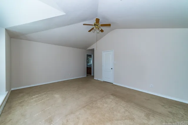 a view of a livingroom with a ceiling fan