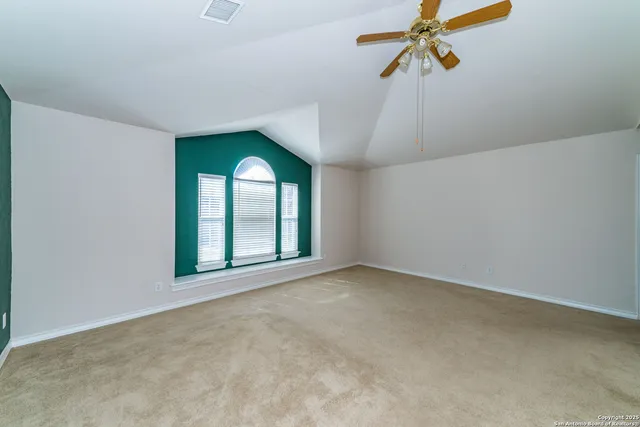 a view of a room with a window