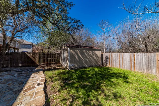 a backyard of a house with lots of green space